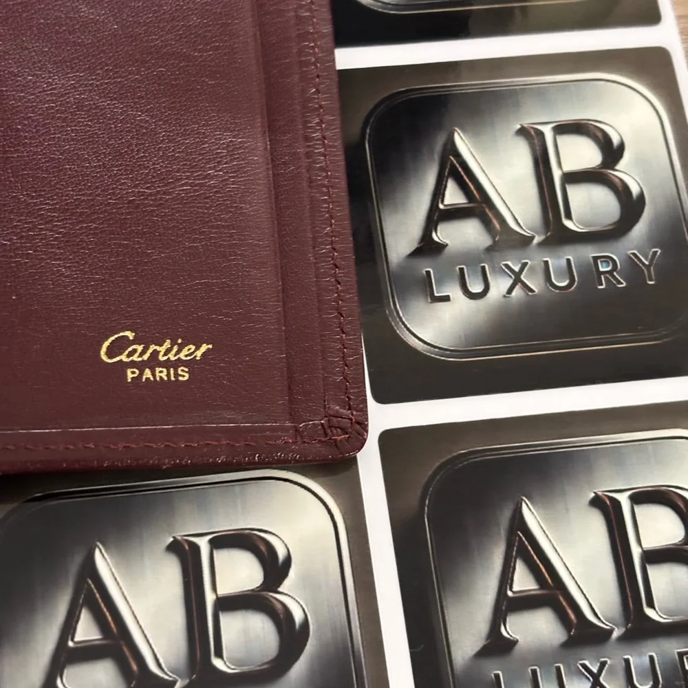 Cartier Burgundy Leather Card Holder with Gold Accents